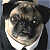 Pixelated image of a dog wearing a dark suit and white shirt, with a light-colored tie, against a gradient background.