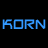 Pixelated text 'KORN' repeated in blue and white on black background with gray rectangle overlay.