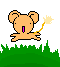 Pixelated orange creature with large ears and purple mouth, holding a yellow-tipped sparkler-like object, positioned over green grass on gray background.