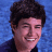 A split-screen buddy icon with a pixelated portrait on the left and green text logo on the right against dark background.