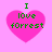Four identical pink heart-shaped icons with green text "I love forrest" on a light pink background, each icon slightly pixelated.