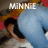 A pixelated image shows a person in blue jeans and dark hair leaning over another figure, with text overlays changing across frames.