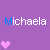 Purple background with pink pixel hearts and repeated 'Michaela' text in varying colors across three