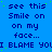 Blue background with repeated dark blue text reading "see this Smile on on my face... I BLAME YOU" and scattered green dots.