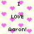 Pixelated icon with repeated text and pink hearts on a light background.