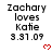 Static image shows text 'Zachary loves Katie 3.31.09' with red heart symbols on white background, partially cropped at bottom right.