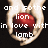 Pixelated image of a red apple with white text overlay reading 'and sothe lion in love with lamb' on a dark background.