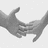 Pixelated grayscale image of two hands shaking, with text reading "Soon I'll be Back in Your arms." on a white background.