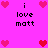 Pixelated pink background with black text 'i love matt' and heart symbols in red and pink, arranged in a pattern