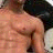 A 2x2 contact sheet of four animated frames showing a shirtless muscular man with changing background and text color, each frame displaying the word "HOTTIE!" in bold font.