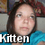 Pixelated image of a person with dark hair wearing a blue top, with the word 'Kitten' in white text at the bottom.