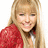 A pixelated image of a smiling person with long blonde hair wearing a red jacket over a white shirt, next to purple text reading 'nobody's perfect' on a white background.
