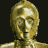 Animated sequence of a golden humanoid robot with changing facial expressions against a dark background.