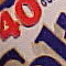 A 3x3 contact sheet of animated frames showing various stylized '40' text designs in different colors, fonts, and backgrounds including red on white with blue accents, dark blue on light gray, beige on maroon, white on black, white on black with stripes, green/red striped background, and red outlined on dark purple.