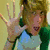 Animated sequence showing two individuals making hand gestures and a smiling pose in separate frames.