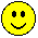 Four yellow circular pixel art faces with black eyes and mouths, two showing red lips in different positions against a gray background.