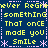 Blue background with yellow text repeating 'Never Regret something that once made you smile' and pink asterisk-like symbols, arranged in a pattern
