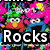 Pixelated image with two cartoon characters and bold text 'Rocks' against a vibrant, multicolored background.