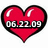 Red heart-shaped icon with black outline and white highlights, featuring pixelated date text across the middle on a transparent background.