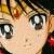 Anime-style close-up of a character's face with large expressive eyes, light skin, and brown hair with golden highlights, rendered in pixelated style.