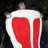 A static pixelated image of a white cup with red liquid, viewed from above against a dark background.