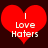 Two identical red heart-shaped icons with white text reading "I Love Haters" on a dark brown background, displayed side-by-side.
