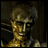Pixelated image of a humanoid figure with discolored skin and dark eye sockets, next to stylized text on a black background.