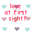 Pixelated red text and heart symbols on white background with gray rectangle overlay.
