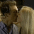 Animated contact sheet showing two frames of a cartoon couple kissing, with visible pixelation and grayscale color scheme.