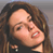 Animated contact sheet showing two frames of a woman with long brown hair and earrings alongside a blue background with "CoolBuddy.com" text in pixelated style.