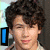 A four- shows a person with curly dark hair and light skin, each displaying different text overlays