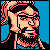 Pixelated static icon of a character with long hair, glasses, and beard against blue background.
