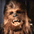 Pixelated image of a furry character with brown hair and teeth, set against dark blue background with red text elements.