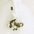 A pixelated static image shows a dark brown object resembling a stylized animal or creature on a light beige background with a small dark vertical rectangle above it.