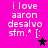 Pixelated text on bright pink background with two star icons in black and purple, showing animation change between frames.