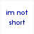 Blue pixelated text on white background reads "im not short" above a partial image of a red and blue object with visible text.