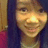 A person with long dark hair and a red top appears in three views showing subtle facial expression changes.