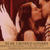 A 50x50 pixel animated buddy icon featuring a romantic couple kissing on the left and text "Romeo & Juliet" on the right against a pink background.