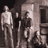 Animated contact sheet of 15 frames showing a sepia-toned group photo with repeated text overlays and partial visibility of figures in front of buildings.