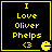 Four identical yellow pixelated text on black background with heart and Pac-Man icon, each reading "I Love Oliver Phelps <3"