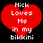 Two identical red heart-shaped icons with white pixelated text reading 'Nick Loves Me in my bikkini' on a black background.