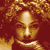 Four 50x50 pixel frames of a celebrity's face arranged in a contact sheet with varying expressions and lighting, displayed on a gray background.