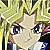 Two anime-style characters with blonde hair and purple eyes appear in a pixelated image above text labels on black background.