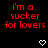 Red pixelated text reads "i'm a sucker for lovers" on black background with two white heart symbols below.