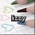 A static icon shows a hand holding a pencil drawing hearts on paper with the name 'Lizzy' in stylized text.
