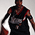 Animated sequence of a basketball player in black jersey with red trim holding an orange ball, showing slight pose changes across frames.