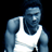 Pixelated static image of a person in a white tank top against black background with blue-toned skin and hair.