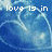 Blue-toned pixelated image with white text reading 'love is in the air' over a heart-shaped background.