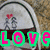six identical showing a cartoon couple under an arch with a red heart, each overlaid with the word 'LOVE' in different colored outlines