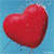A red heart-shaped object with a glossy surface appears against a light blue pixelated background, rendered in low-resolution digital art style.